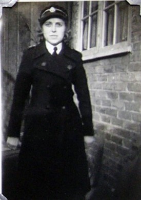 Photo:Phyllis Cox in her Red Cross uniform, Wendling Road 1945