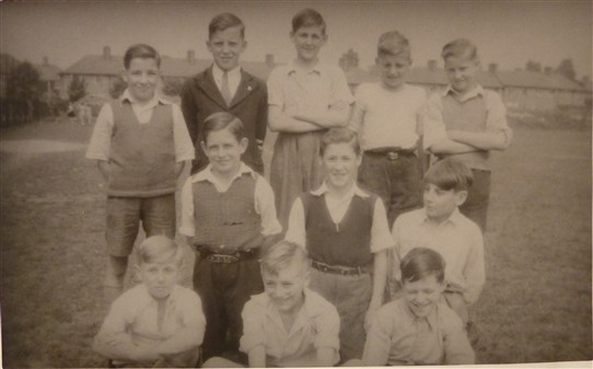 Photo:Glastonbury School pupils 1943(ish) - Sports Team  Taken at Glastonbury School.  Can you identify the missing names?  From left - Top row -  George Cowan, Les Lynch, Peter Reekes, ?, ?, Blandon.  From left - Middle row -  ?, ?, Graham Robinson.  From left - Bottom row -  ?, Brian Ransted, ?.
