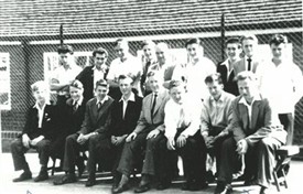 Photo:Class photo taken after completion of the workshop. Back row from left to right Johnny Poole, Freddie Mole, Johnnie Tipple, Chris Stocks and Mr Harry Strutton, the brickwork master, Eddie Blanchard, Roger Carnegie, Michael Ferris and Frank Reed. Front left to right; Dave Squire, Jack Roach, Peter McDonald, Gerry Batchelor, Bill Lake (Wilbur), Michael Spellar, Rob Todd and Maurice Cooper.