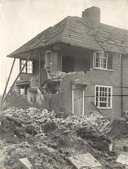 Photo:War damage on St. Helier