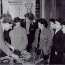 Photo:Safety First lessons at Tweeddale School. St.Helier 21st Nov. 1953. Mr Humphries (chief instructor) gives hints on engines to some club members.